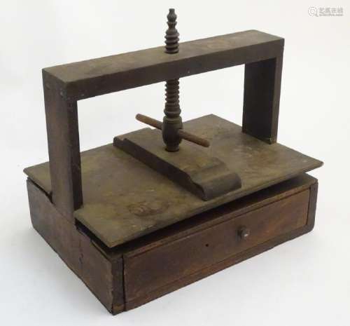 Bookpress: A 19thC mahogany bookpress with draw under