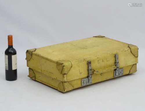 An early / mid 20thC vellum suitcase with dual locking