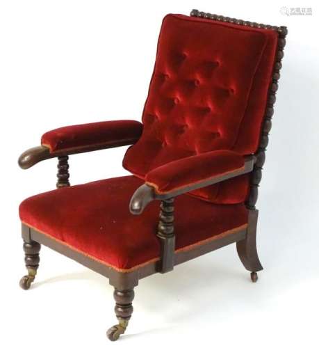 A mid 19thC mahogany open armchair chair with a bobbin