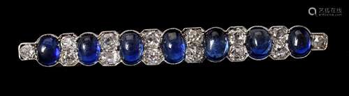 A mid 20th century sapphire and diamond bar brooch