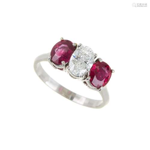 A ruby and diamond three stone ring