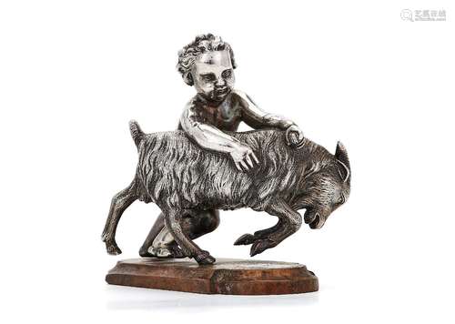 A Victorian silver model of a cherub with a billy goat