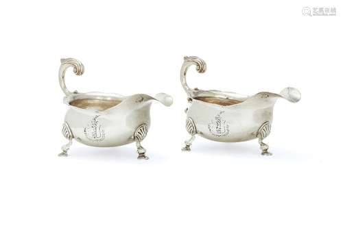 A pair of George II silver oval sauceboats by Henry Brind