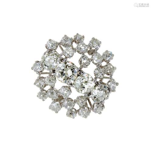 A diamond cluster dress ring