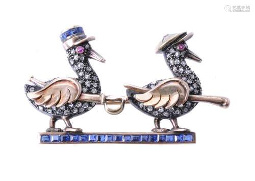 A 1940s French Tunisian diamond and sapphire novelty Gendarme duck brooch