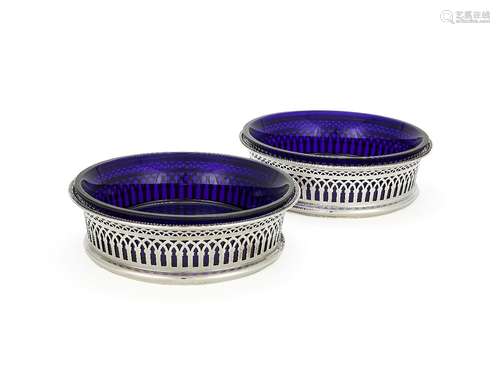 A pair of Continental silver coloured circular baskets