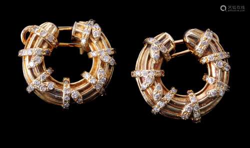 A pair of hooped diamond earrings