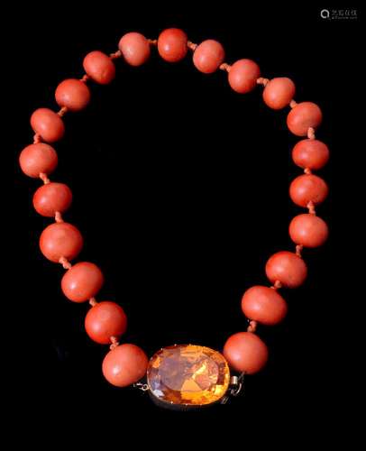 ϒ A mid 19th century golden topaz clasp with coral necklace