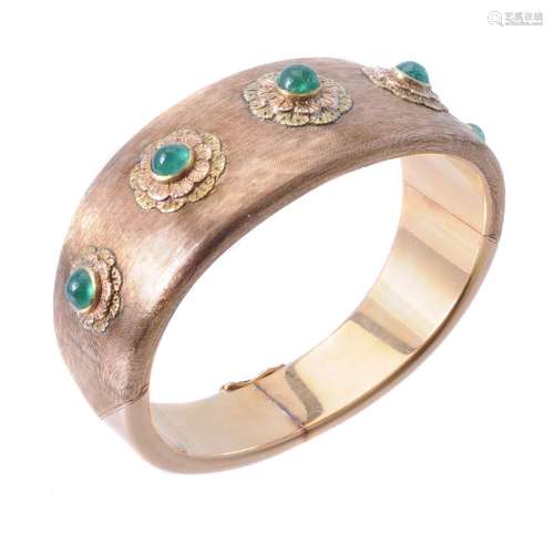 An emerald flower head bangle by Cazzaniga