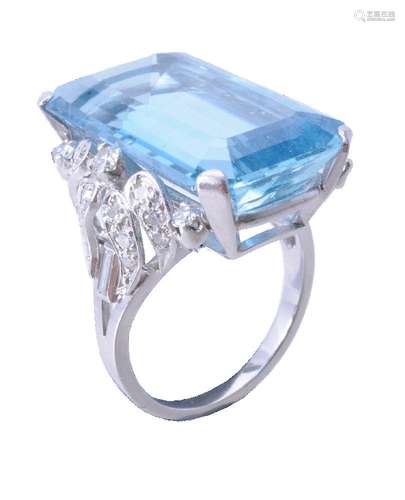 An aquamarine and diamond dress ring