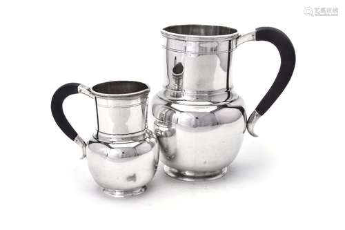 Two Italian silver coloured jugs by Ilario Pradella