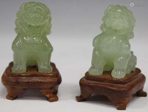 PAIR OF CARVED SERPENTINE FOO DOGS W/ STANDS