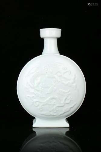 A CARVED QINGBAI-GLAZED MOONFLASK.MARK OF YONGZHENG