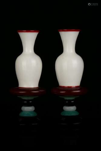 A PAIR OF RUBY-RED OVERLAY GLASS VASES.MARK OF QIANLONG