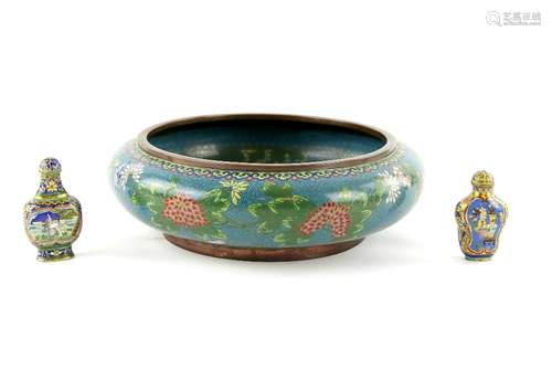 A Chinese cloisonne enamel brush washer of typical form, decorated on the blue ground with floral