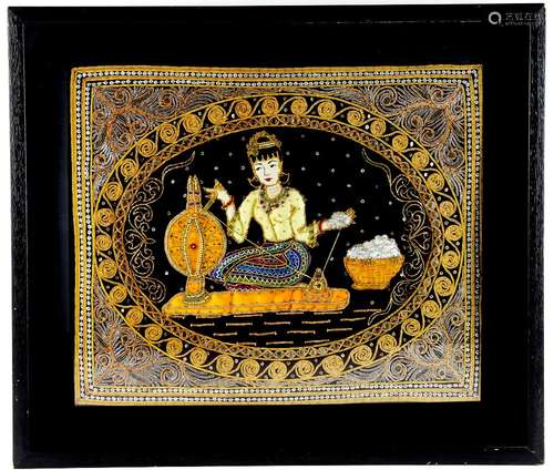 A Thai kalaga textile depicting a seated lady, wearing an elaborate chignon, head dress and costume,