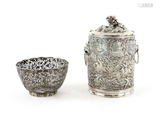 A Chinese Export silver tea canister and domed cover with mythological animal finial, and loose-ring