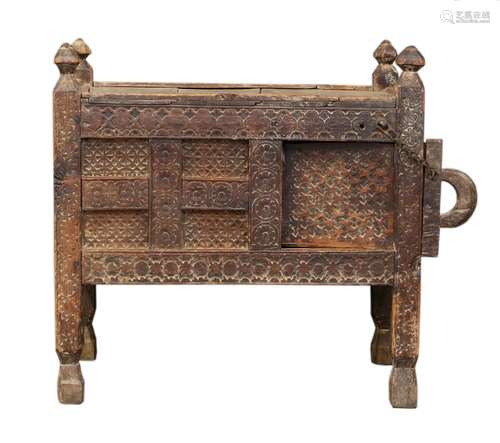 A Indian Dowry, wood Chest with chained, sliding door, decorated with circular and other abstract