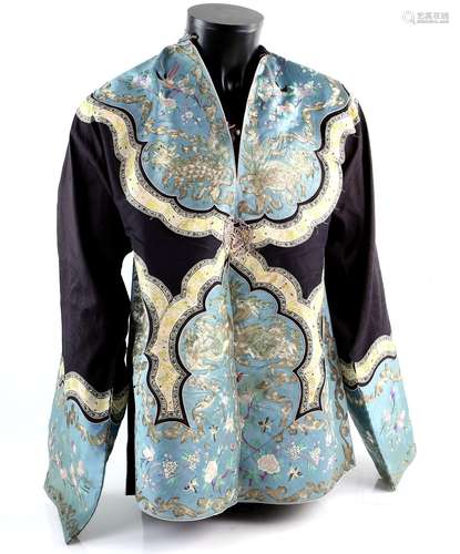 An elegant Chinese textile jacket with matching turquoise blue cuffs and facings; decorated with two