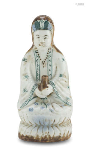 PORCELAIN SCULPTURE, CHINA 20TH CENTURY representing Guanyin holding the vase of the immortality.