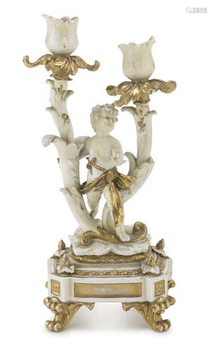 SMALL TWO-BRANCHED CANDLESTICK IN CERAMICS, LATE 19TH CENTURY entirely in white enamel and gold,