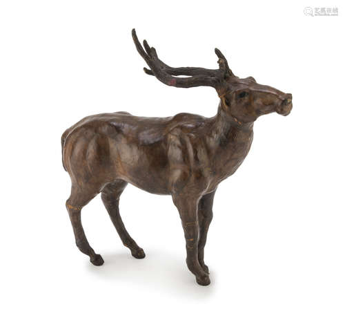 LEATHER SCULPTURE OF A BUCK, 20TH CENTURY in pose. Measures cm. 34 x 10 x 37. Defect to a leg.