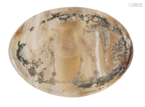ENGRAVED GEM, 1st-2nd CENTURY in agate chalcedony engraved and smoothed. Ring Castone of elliptic
