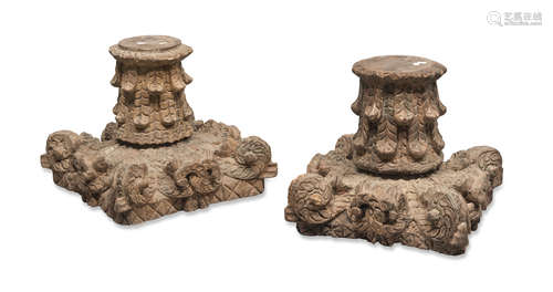 A PAIR OF WOOD CAPITALS, INDIA LATE 19TH CENTURY carved to twisted leaves and lotus flowers.