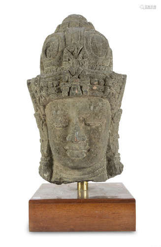 BIG HEAD IN SANDSTONE, CAMBODIA 20TH CENTURY representing the face of Buddha realized in khmer