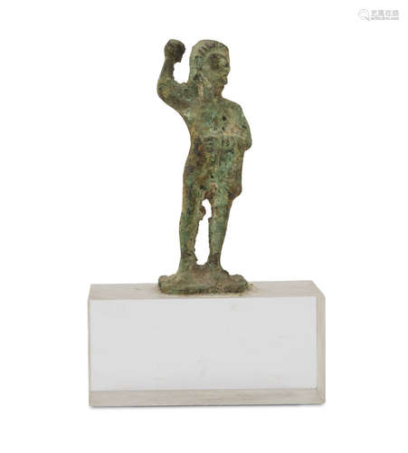 BRONZE SCULPTURE, 20TH CENTURY of archaic style, with green patina, representing figure in pose with