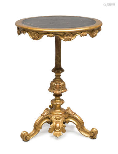 SMALL TABLE IN GILTWOOD, 19TH CENTURY carved to motifs of leaves, scrolls and pods. Crenellated