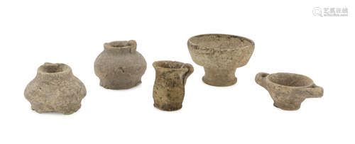 FIVE MINIATURE VASES, 4TH CENTURY B.C. in beige clay. Entire. h. cm. 3-5 cm, diameter cm. 3-7. The