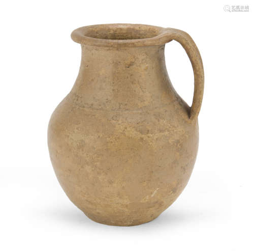 EARTHENWARE JUG, 3rd CENTURY B.C. in bright beige clay and opaque black varnish. h. cm.14. The