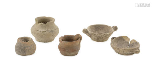 FIVE MINIATURE VASES, 5TH-4TH CENTURY B.C. in clay. Entire-fragmentary. Cm heights. 4 to cm. 1,5.