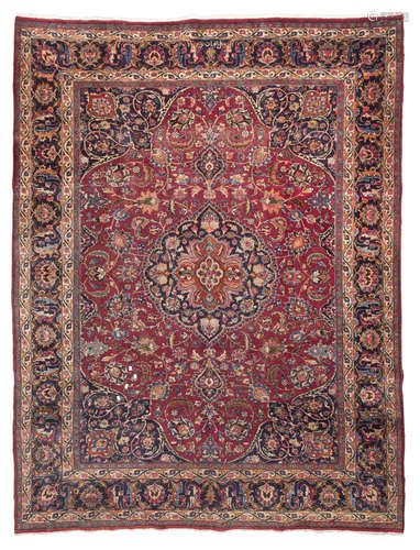 TABRIZ CARPET, EARLY 20TH CENTURY medallion with palmette and Herati pattern and secondary motifs of