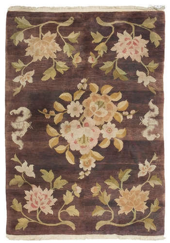 A TIEN-TSIN CARPET, CHINA 20TH CENTURY design of flower branches and cloudies with insects on a