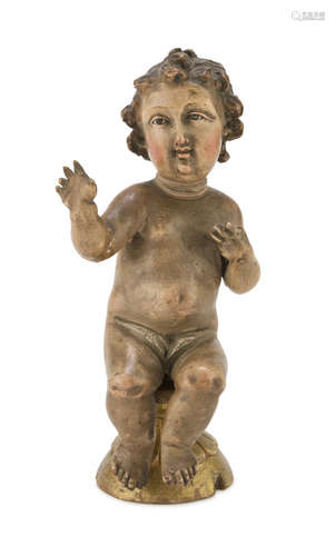 SCULPTURE OF THE CHILD IN WOOD, 18TH CENTURY in polychromy, with glass eyes. Measures cm. 22 x 11