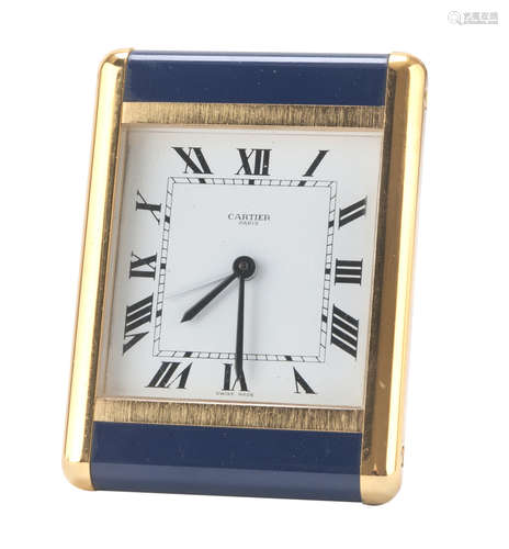 TABLE ALARM CLOCK CARTIER, '50s case in brass and enamelled metal. Quartz movement, button with hard