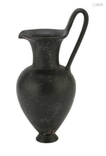 BUCCHERO JUG, 6th CENTURY B.C. in black polished. Entire. H. cm. 20. The find is reported to the