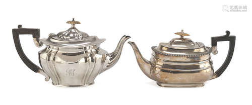 TWO SILVER-PLATED TEAPOTS, PUNCH LONDON 1864/1893 oval bodies with wooden handles and knobs in