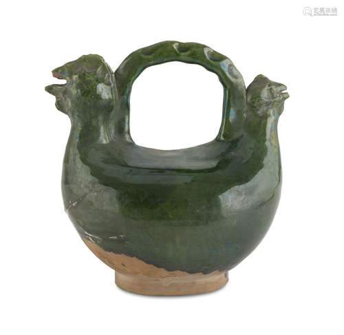 GREEN GLAZED CERAMIC PITCHER, CHINA 20TH CENTURY with final of zoomorphic shape. Measures cm. 20 x