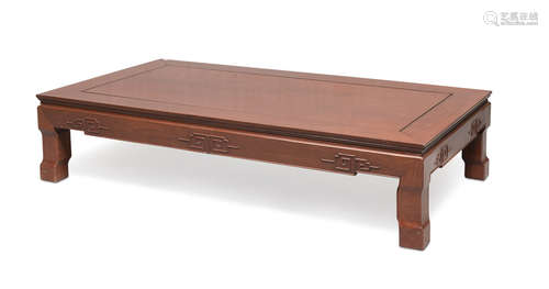 LIVING ROOM TABLE IN TEAK, CHINA 20TH CENTURY apron carved to meander. Feet as elephant legs.