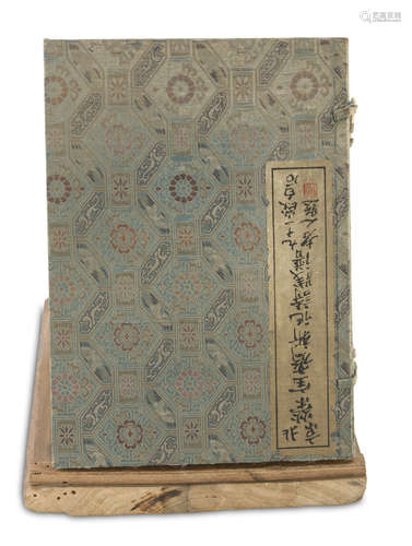 TWO ILLUSTRATED BOOKS, CHINA 20TH CENTURY consisting of watercolored panels with naturalistic