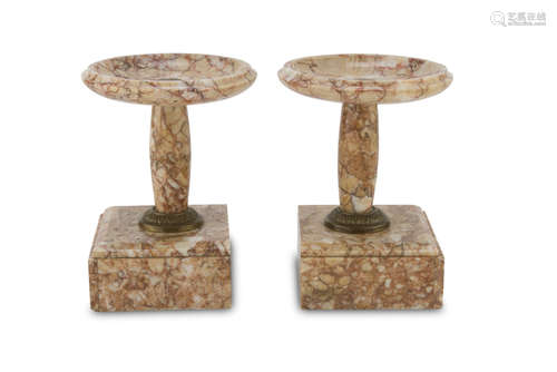 A Pair of Red Verona Marble Stands, EARLY 20TH CENTURY with round dish and finishes in gilded metal.