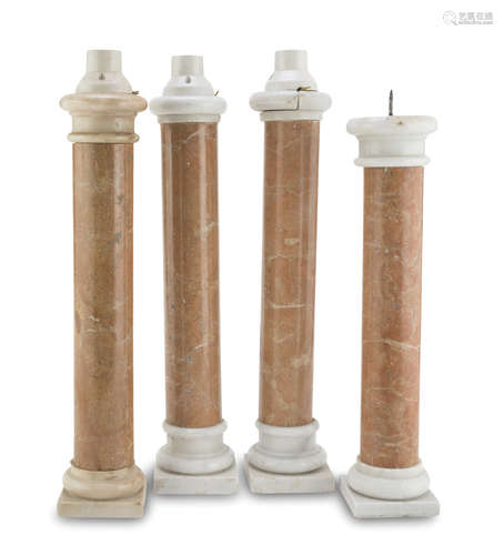 FOUR COLUMNS IN RED VERONA MARBLE, LATE 19TH CENTURY with capitals in white statuary marble. Max.