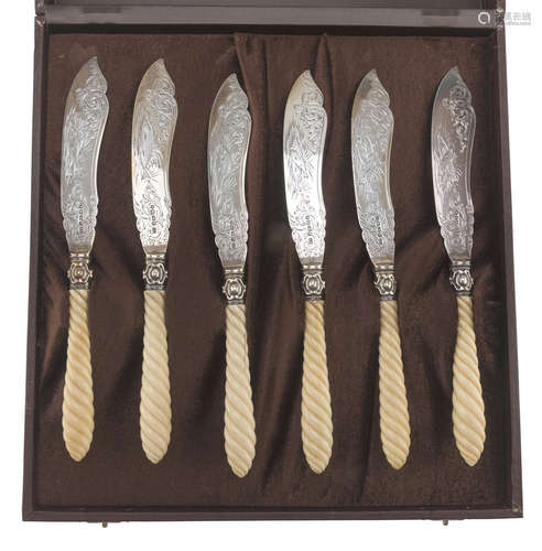 SIX FISH KNIVES IN SILVER, PUNCH BIRMINGHAM 1864 with bone handles and blades chiseled to figures of