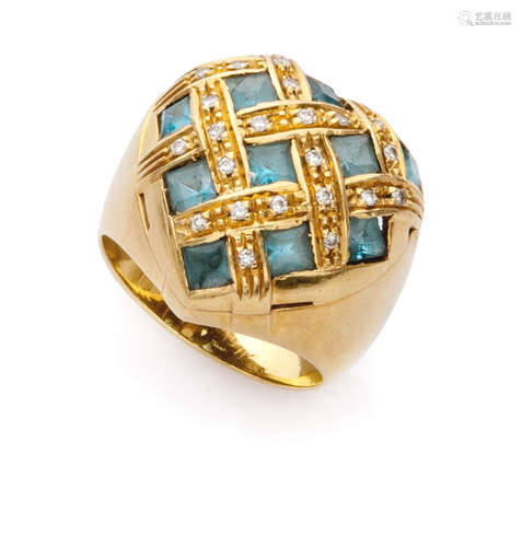 RING in yellow gold 18 kts., with heart-shaped aquamarine and braided bands embellished with