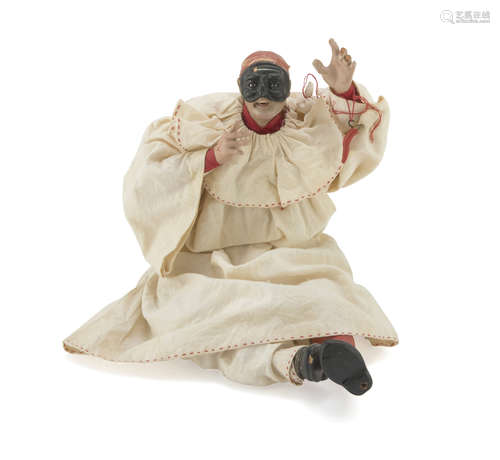 PULCINELLA DOLL, NAPLES LATE 19TH CENTURY in ceramics and wood, with clothes in cotton. Measures cm.