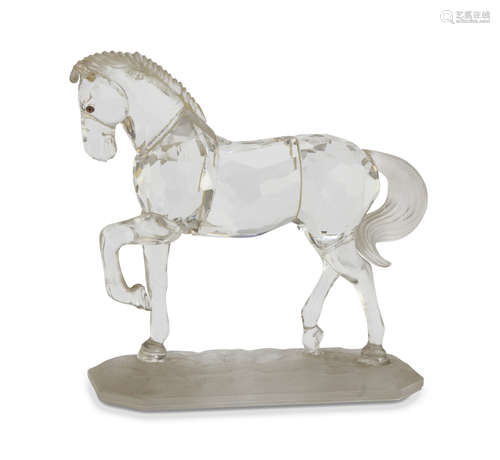 SMALL SCULPTURE IN CRYSTAL GLASS, SWAROWSKY 20TH CENTURY representing a horse. Tail in opalines.