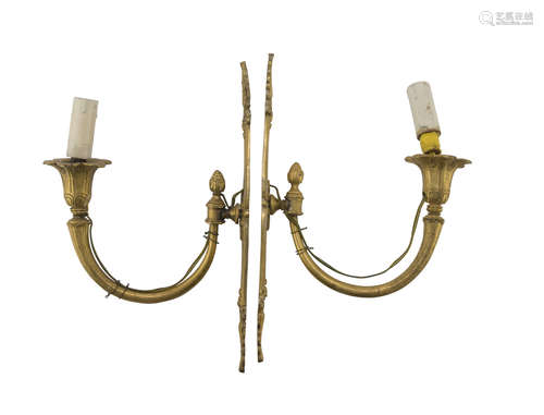 A PAIR OF APPLIQUES IN ORMOLU, EARLY 19TH CENTURY with vegetal chisels and cornucopia arms. Measures